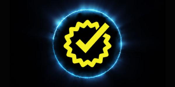 On a black background, a yellow checkmark appears in the middle. Around the checkmark is a yellow circle, and around that is a bigger light blue circle.
